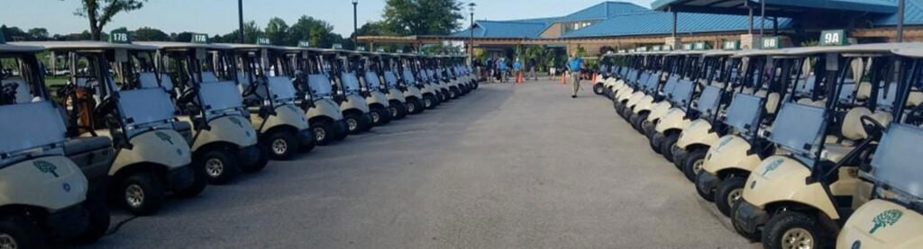 2 long lines of golf carts